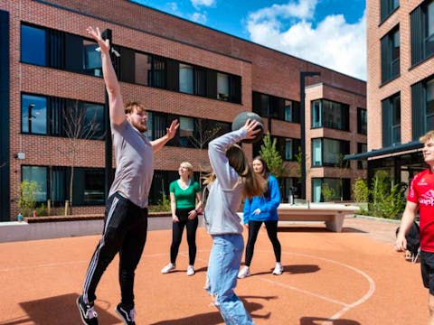 Highfield-House-Residents-on-Basketball-Court-720x480